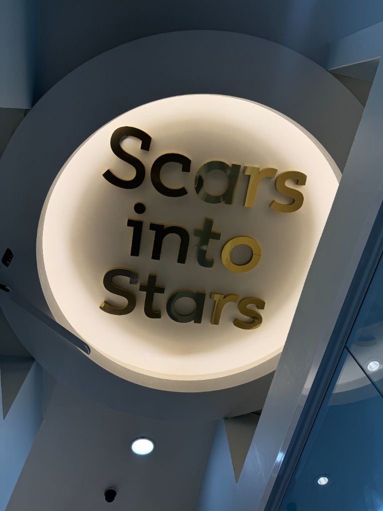 "Scars into Stars"